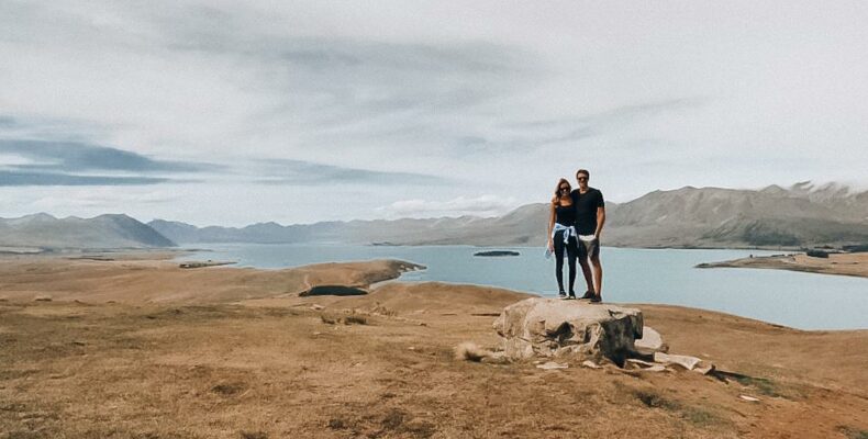 ESTP ISFJ Relationship: Maia and Tom on a rock in New Zealand