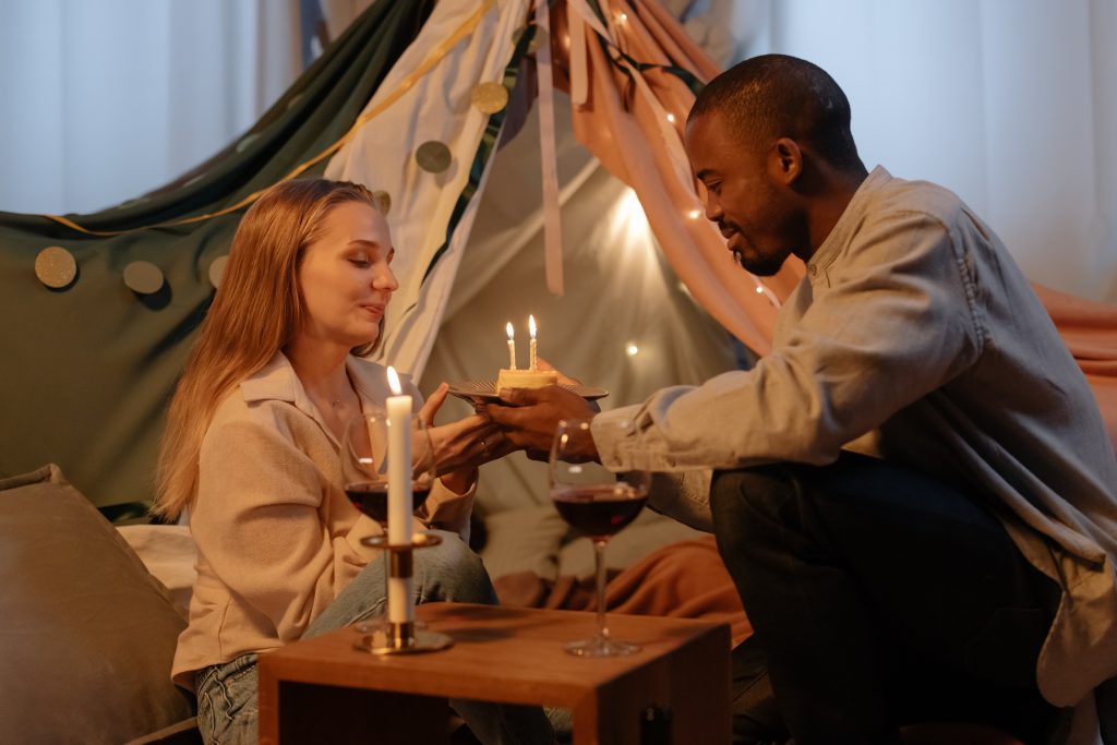 couple love celebrating birth day cake 